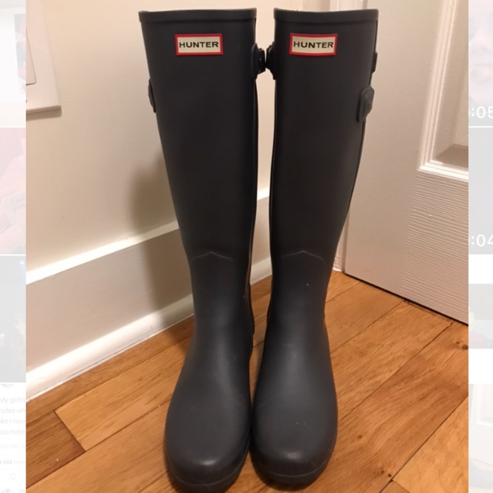 Tall blue and black HUNTER boots